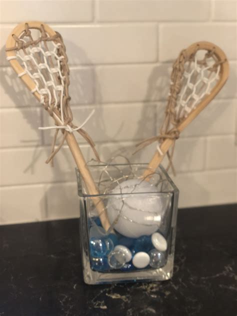 lacrosse party ideas|mini lacrosse sticks for centerpieces.